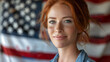 beautiful girl with freckles and red hair near an American flag.