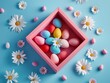 A pink gift box with eggs and fresh spring flowers on blue pastel background. Abstract minimal Easter concept. 