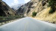 Open road through rugged mountain pass