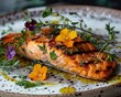 A gourmet dish of grilled salmon with a citrus glaze garnished with fresh herbs and edible flowers