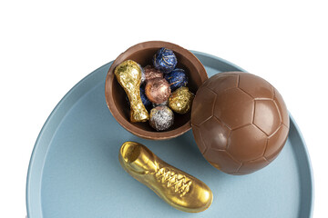 Wall Mural - Easter egg in the shape of a soccer ball filled with small assorted chocolates_6.