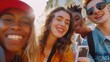 Close-up shows a diverse group of pals smiling and snapping selfies on the street. A cheerful interracial group of young hipsters poses for a picture outside and looks at the camera. laughter day