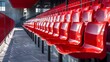 The individual plastic seats are joined together to create a cohesive seating arrangement in the stadium.