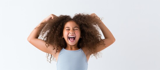 Sticker - Adorable little girl with curly hair wearing a vibrant blue tank top, looking cheerful and playful