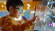 A young boy, engrossed in interactive learning, touches a digital screen filled with neural networks, showcasing the dynamic world of AI-powered education.