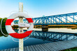 © Expert Photography - Den Blå Bro bridge over the Gudenå river at the wooden dock with a posted lifesaver and water reflection