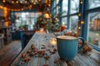 A rustic blue mug of coffee on a wooden table adorned with holiday decorations and warm string lights.