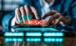 Person adjusts digital risk assessment slider, visually illustrating concept of risk analysis and decision-making in business, with the slider set towards the maximum or high-risk end of the spectrum