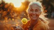 Elderly woman playing tennis expressing joy, concept of golden age, zest for life, and seizing the moment