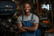 © My Beautiful Picture - Smiling mechanic black man. Automotive professions. Job offer. Job Search. Machine repair professions. Black man. Africa. Afro american.  AI.