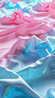 An abstract image of light reflecting on wavy, satin fabric creating a mesmerizing gradient of pink and blue shades