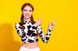 Photo of excited cheerful lady dressed cowskin top showing two fingers empty space isolated yellow color background