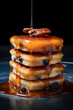 Delicious square pancakes with honey and blueberry. Healthy breakfast concept with copy space