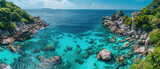 Fototapeta Fototapety do akwarium - A photo of a Islands, with crystal clear water and vibrant coral reefs as the background, during a sunny day 