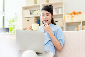 Wall Mural - Photo of young Asian girl at home