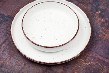 Empty round ceramic plate set.