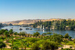 Aerial panoramic view of the Nile river with Feluccas (traditional egyptian sailing boats) in Aswan, Egypt