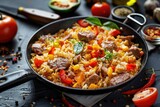 Fototapeta Tulipany - Fried rice with vegetables and meat in a frying pan