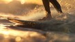 © Helga P-A. - Surfer on the beach at sunset. Extreme sport and active life concept