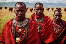 Maasai Tribe Of Kenya East Africa Dressed In Traditional Bright Red Clothing Wearing Jewellery, Nature Background