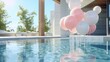 Balloons gracefully ascend from a luxury pool, casting reflections and adding whimsy to the scene.