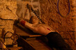 Mannequin of the victim in the dungeon of the torture chamber on torture.