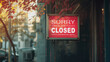  Sorry we're closed sign hanging outside a restaurant, store, office or other