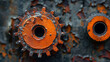Close-up of rusty gears with peeling orange paint on a weathered metal surface.