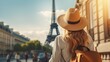 © DailyStock - Woman with Backpack and Stylish Hat Posing in Front of Paris Eiffel Tower. World Travel Concept. Perfect for Celebrating Woman's Day, Birthdays, Valentine's Day, Banner or Poster.