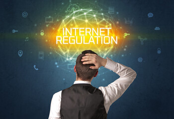 Poster - Rear view of a businessman, online security concept