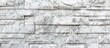 A pristine white marble wall showcasing a wide array of distinct textures and patterns for architectural or interior design concepts