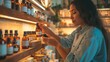 Hispanic shopper selects essential oils, embodying mindful decisions in a warm, ambient shop