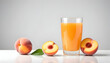 glass of peach juice isolated on a white background