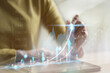 © Montri - Increasing income financial chart. Businessman use laptop to analyzing growing chart for showing successful increase in business profit on virtual screen. homebroker monitor with stock exchange chart.