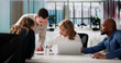 © Andrey Popov - Business Meeting In Office Boardroom