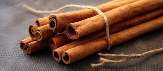 Wall Mural - Close-up of bundled cinnamon sticks