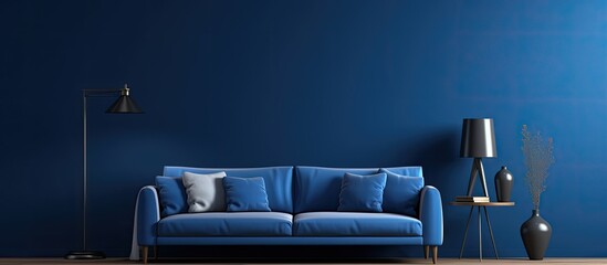 Canvas Print - A serene living room with a comfortable blue sofa, a stylish lamp with a shade casting a warm light