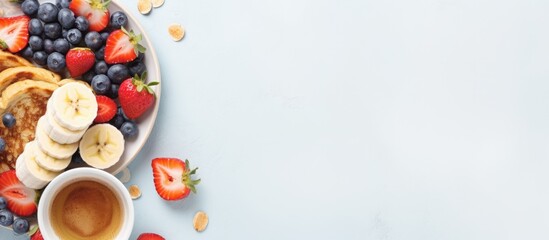 Canvas Print - Delicious pancakes topped with fresh fruit and a cup of coffee