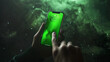 Mockup of an iPhone with a green screen, hand holding an iPhone, on a space backdrop