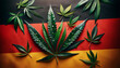 Cannabis leaves are gracefully scattered across the horizontal stripes of the German flag. Concept of legalization of cannabis in Germany.