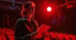 © Gefo - A theatre director in creative attire, holding a script, standing in a rehearsal space, photorealistik, solid color background