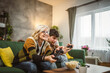© Miljan Živković - teenager male and his mother mature woman man play console video game