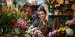 © Julia Zarubina - young female florist in an apron makes a bouquet in a flower shop, small business, plants, nature, beauty, girl, woman, seller, worker, employee, holiday, businesswoman, smile, portrait, face