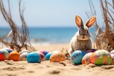 Fototapeta Londyn - Easter bunny with colorful eggs on beach