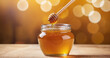  Honey in the jar with stick on wooden counter with bokeh background - Generative AI