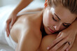 Caucasian woman enjoying massage at spa salon hotel, therapist treatment
