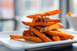 Close-Up Delicious Stack Of Sweet Potato Fries On A White Plate In Food Restaurant Interior, Fries Food Photography, Food Menu Style Photo Image