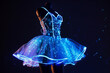 Glowing neon ballet dress in the dark room, on a mannequin doll. Copy space in background
