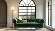 © Ziyan - Vibrant green velvet sofa against arched window near ball floor lamp and stone cladding wall. Mediterranean style home interior design of modern living room.