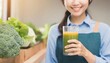 Smiling Asian Woman with Vegetable Juice